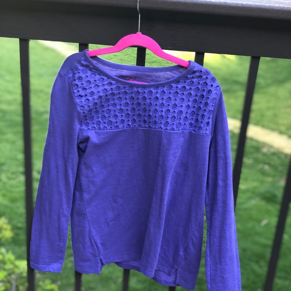 Simple blue long sleeve shirt.